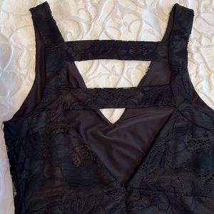 GUESS black dress. Classy lace design with sexy V back.